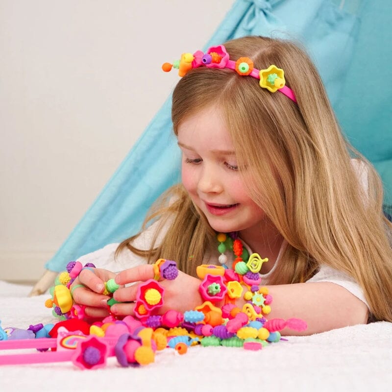 Kindersieraden maken van klikkralen